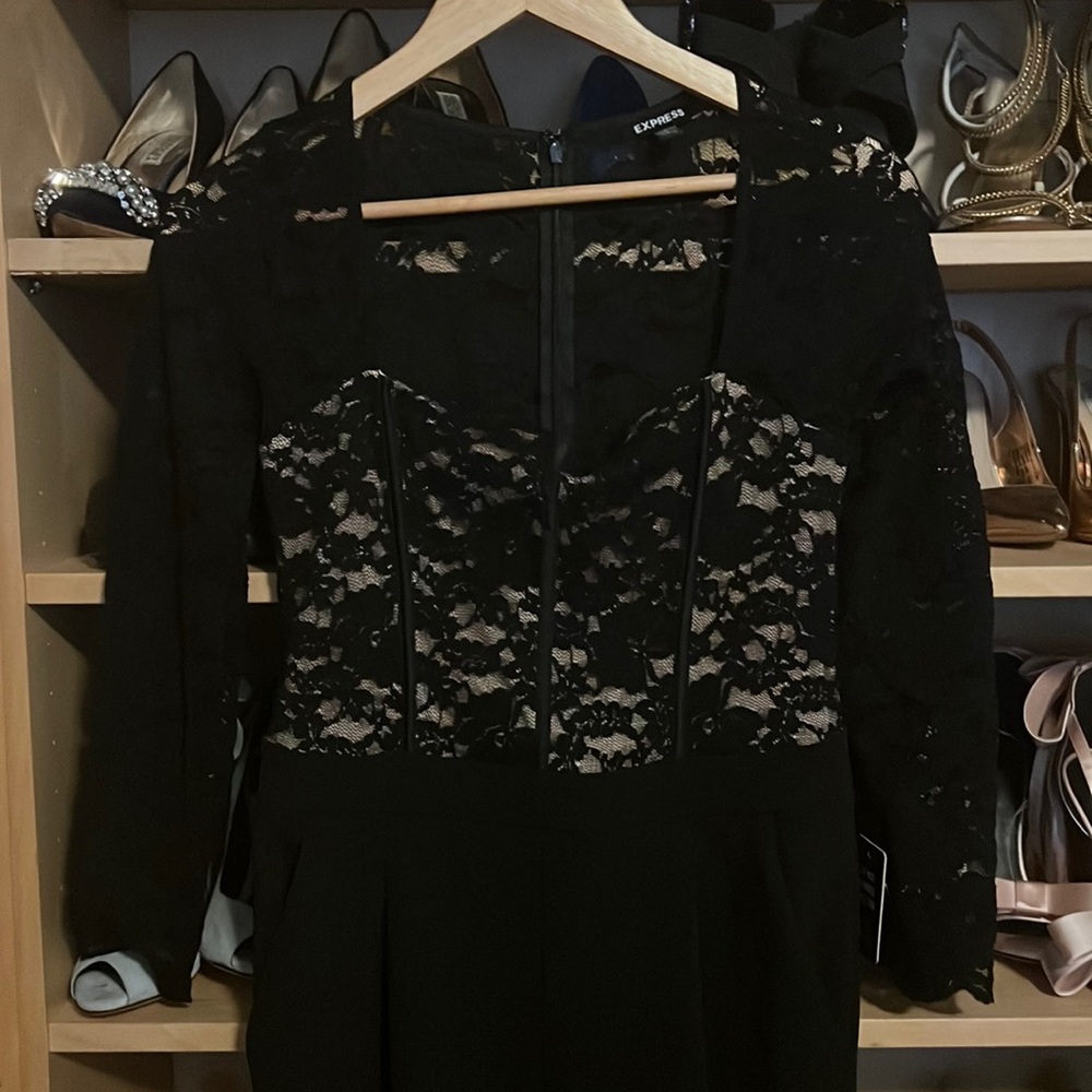 Lace black jumpsuit with long sleeves. Size small